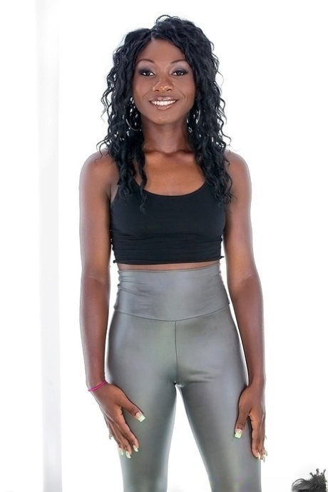 Ebony sugar in silver leggings undressing and exposing her ass 66832629